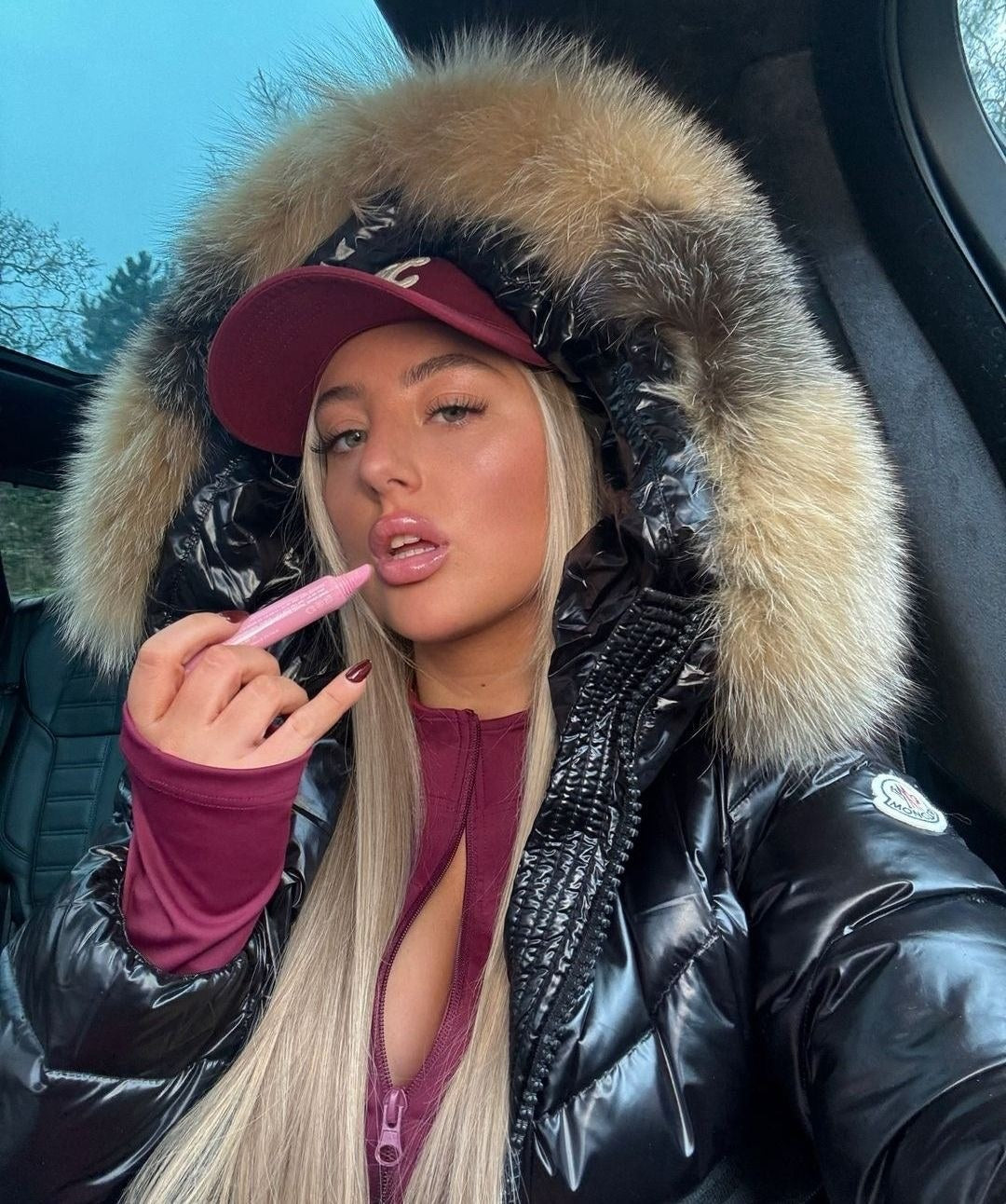 Black jacket with burgundy top and cap